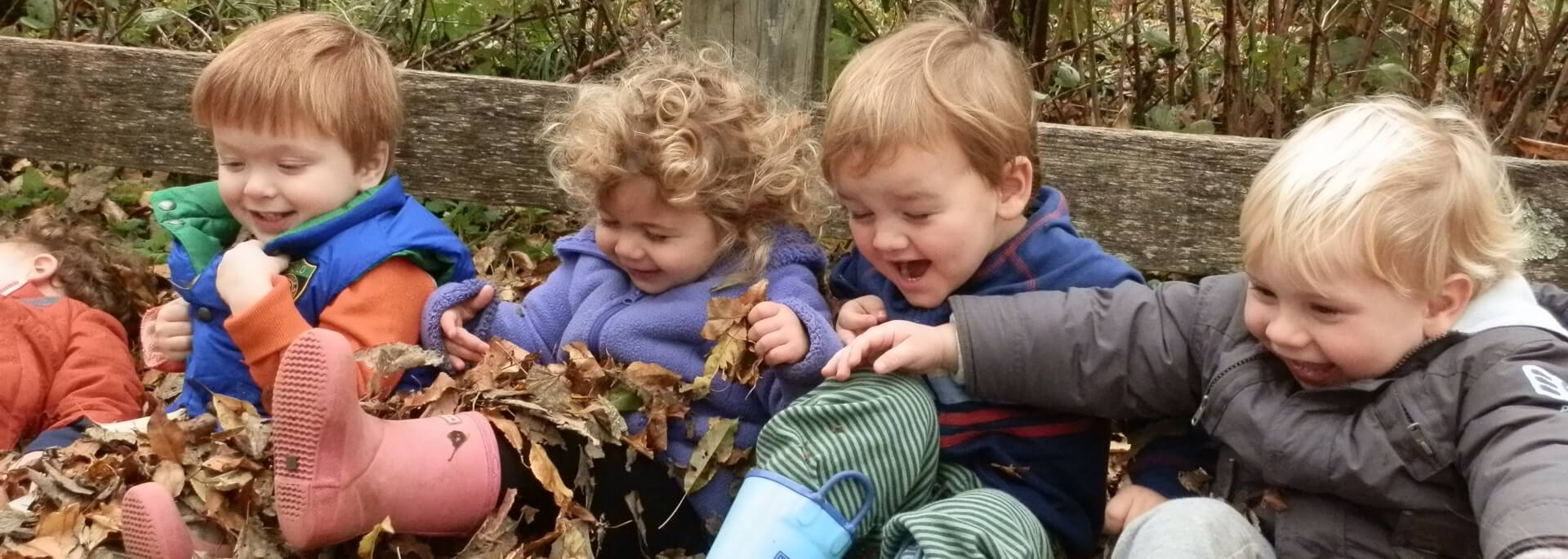 Toddlers playing outside.